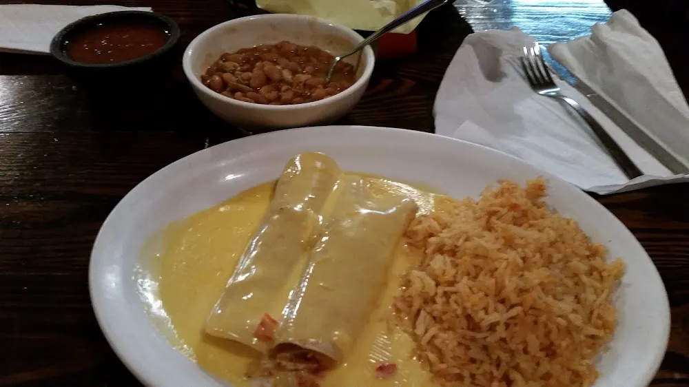 Tamale with Gravy & Cheese